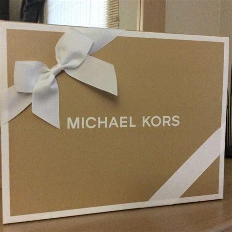 packaging michael kors gift wrap|Michael Kors gift wrappers.